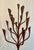 Fabulous artisan hand wrought iron floor chandelier in the style of Gregory Litsios. Brutalist style, with an earthy...