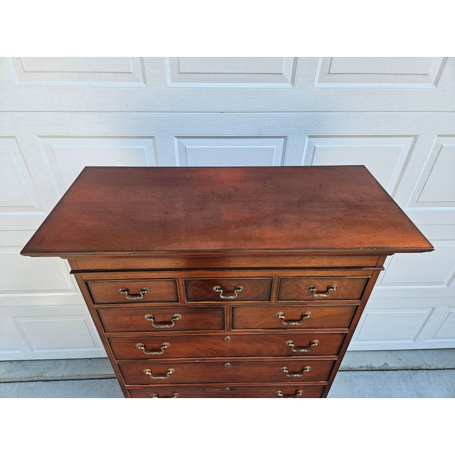 A tall and wonderfully crafted nine drawer dresser from Drexel Heritage’s Collector's line. This dresser features brass...