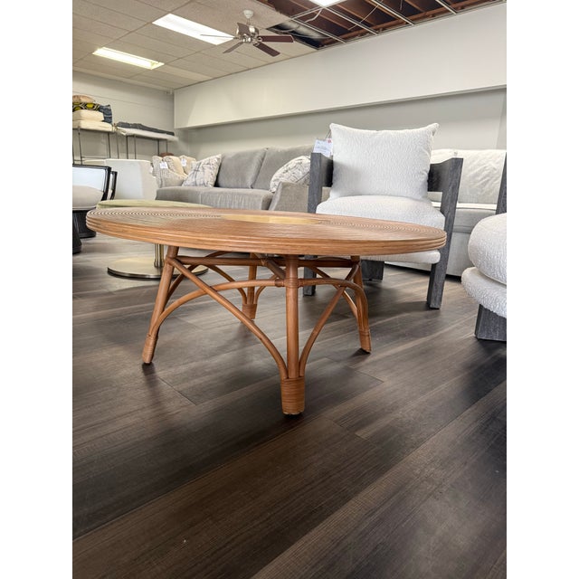 The Brooks Rattan Coffee Table brings relaxed, natural texture to any living space. Crafted with beautifully woven rattan,...