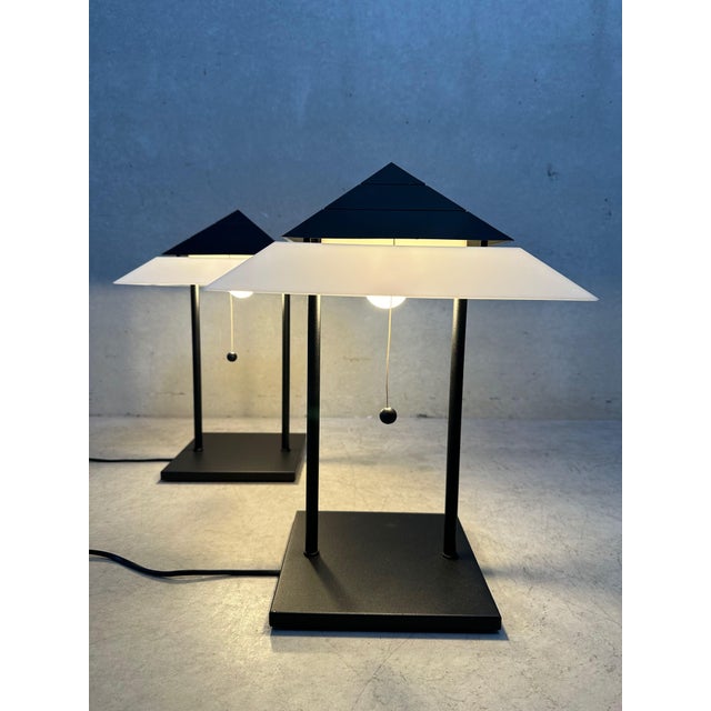 Vintage 1980s designer lamp by Vrieland Design (Netherlands). Black metal frame with a pyramid-shaped shade. Shade made of...