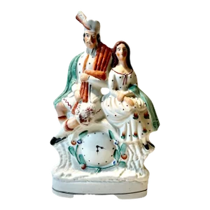 19th Century Staffordshire Scottish Man and Girl Figurine