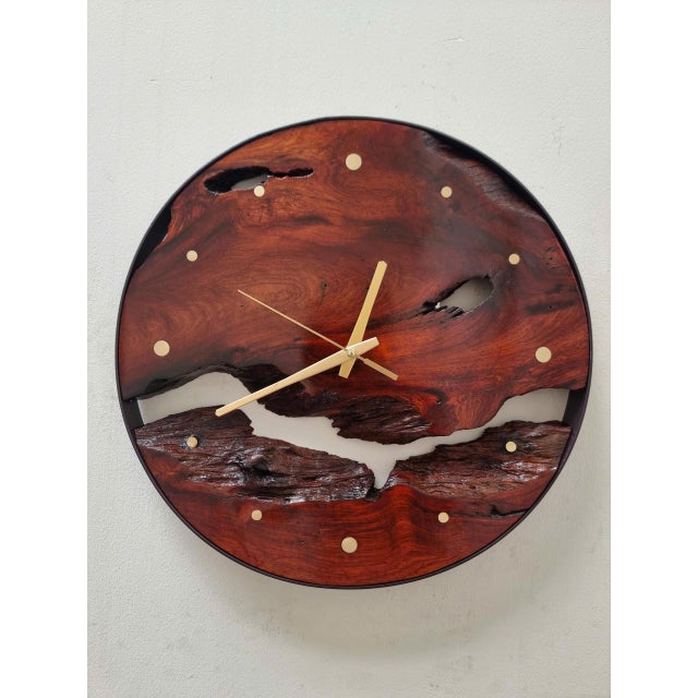 Traces of the River – One-of-a-Kind Handcrafted Driftwood Wall Clock Inspired by the natural traces and flowing movement...