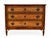 A Louis XVI style light walnut chest of drawers with three drawers adorned with fluted motifs and gilt handles. Very good...
