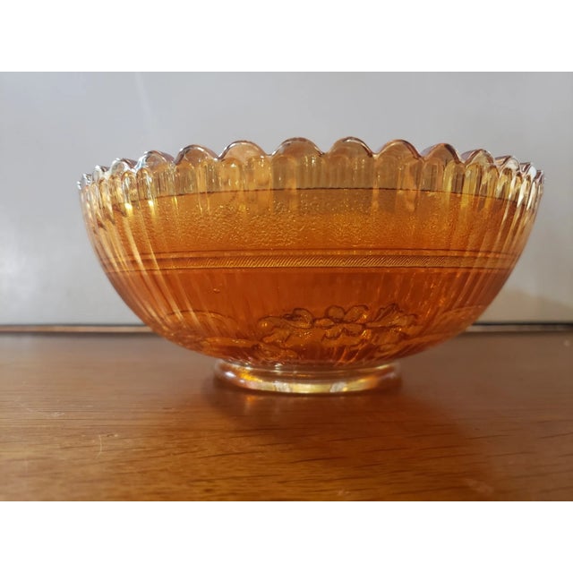 This is a Vintage Imperial Glass Marigold Carnival Windmill Pattern Footed Bowl with Scalloped Edges. It measures 2 3/4"...