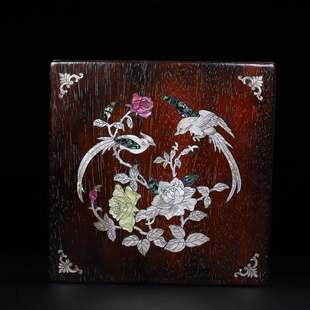 A beautifully crafted Chinese square box, likely made of Zitan wood. The piece features a flat, hinged lid and rests on...