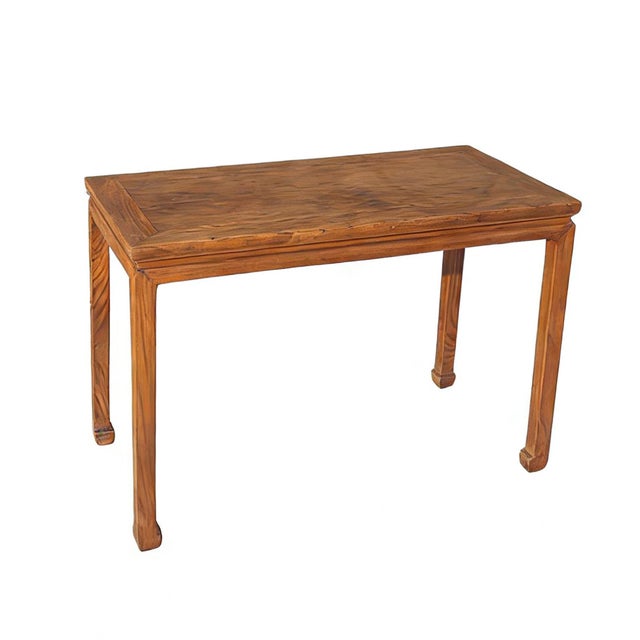 This late-18th century elm side table features classic square-corner construction with a flush-panel top. The design is...