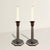 Geometry meets glamour in this rare pair of English Art Deco candlesticks, their forms built from alternating octagonal...