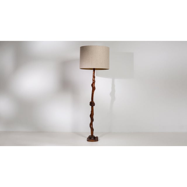 Carved walnut floor lamp in Rich Walnut Brown. Finished in rich walnut brown, this carved walnut floor lamp is...