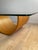 A sculptural coffee table by Hjellegjerde — one of Norway's most established furniture manufacturers, with roots going...