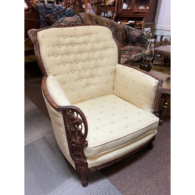 Beautiful reupholstered pineapple motif with impressive walnut carved detailing remains in excellent condition.
