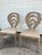 Pair of Vintage Hollywood Regency Cast Aluminum Dining Chairs with banana leaf motif. They have been painted taupe color...