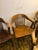 Up for auction is a matching set of six (6) vintage solid wood banker's (captain's) chairs manufactured by The B. L....