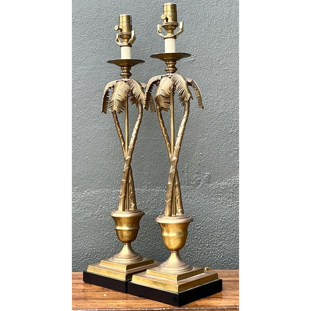This elegant pair of vintage palm tree table lamps captures the glamour and escapist spirit of mid-20th-century design....