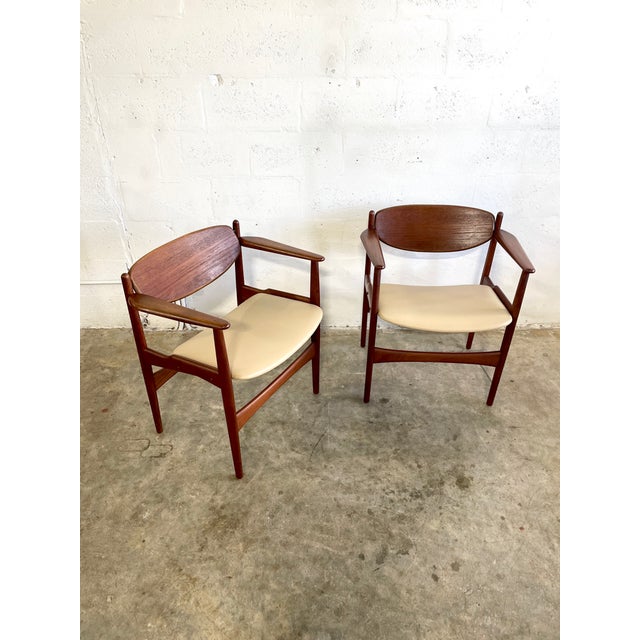 Danish modern design by Arne Hovmand Olsen from the 1950's. The backs are hinged to contour the sitter's back. New...