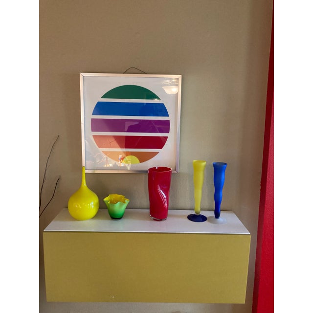 Fabulous vintage Orrefors squeeze red blown hand. Rafted vase. It’s about 11” tall.