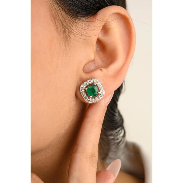 This is part of Chairish’s Fine Jewelry assortment. These elegant 14K white gold stud earrings feature dazzling cushion-...
