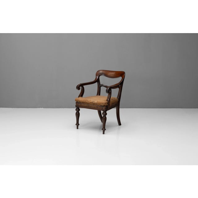 Mahogany carver chair with turned legs. U.K circa 1870.