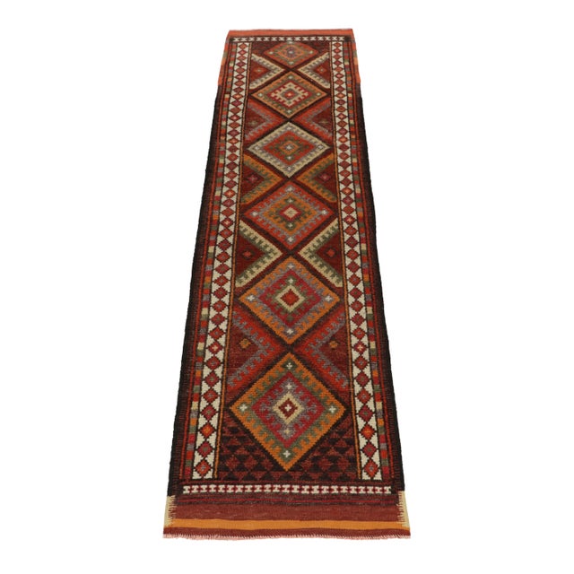 Hand-knotted in wool, a 3x12 runner from Rug & Kilim’s latest curation of rare, vibrant tribal rugs. Originating from...