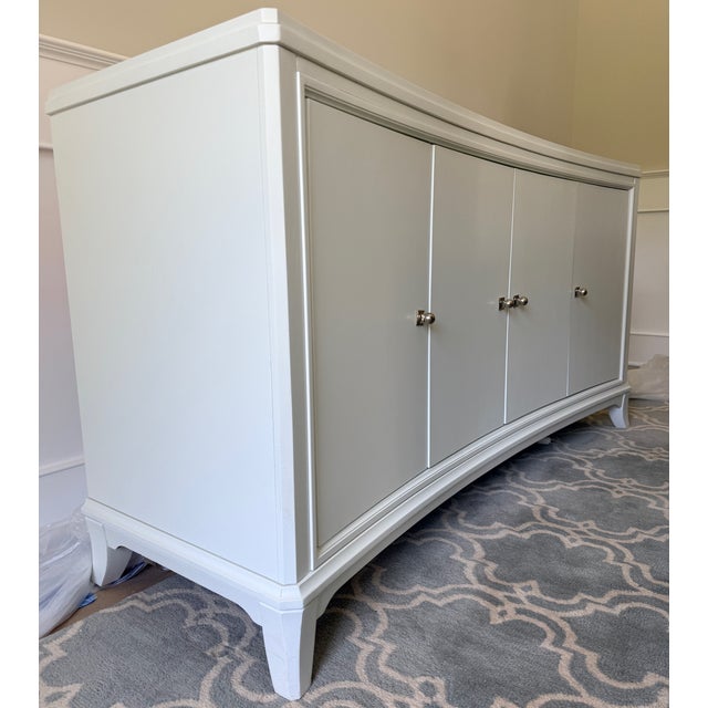 Paper White Buffet from Thomasville This piece provides a lot of great storage in a pretty package. 4 doors hide shelving...