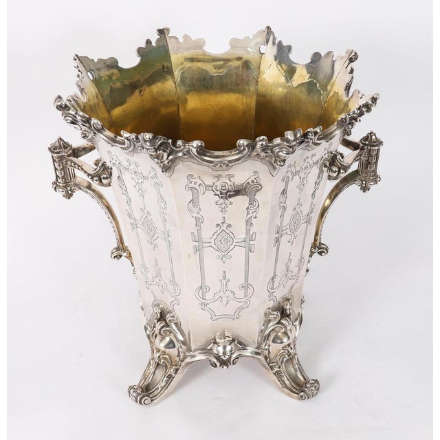 This is a superb quality decorative antique silver plated ice bucket or wine cooler by the renowned silversmiths...