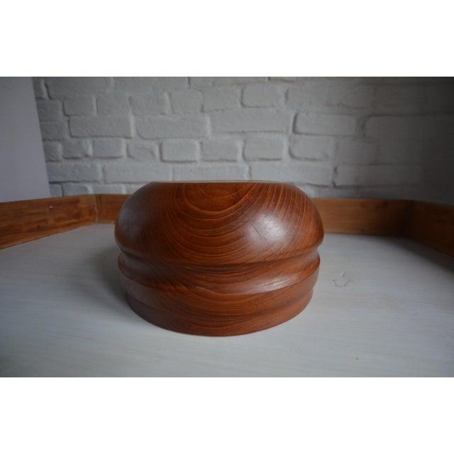 Beautiful vintage teak bowl from Denmark. Good condition. A few scratches and a small crack on the bottom are visible in...