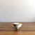 Vintage miniature ceramic bowl designed by Gunnar Nylund for Rörstrand, Sweden, dating approximately to the 1950s. The...