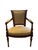 Pair of Neoclassical/Louis XVI-style armchairs featuring carved warm wood frames with scrolled backs, padded armrests, and...