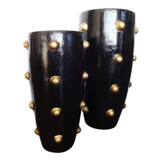 Pair of Black and Gold Sculpture Planters For Sale
