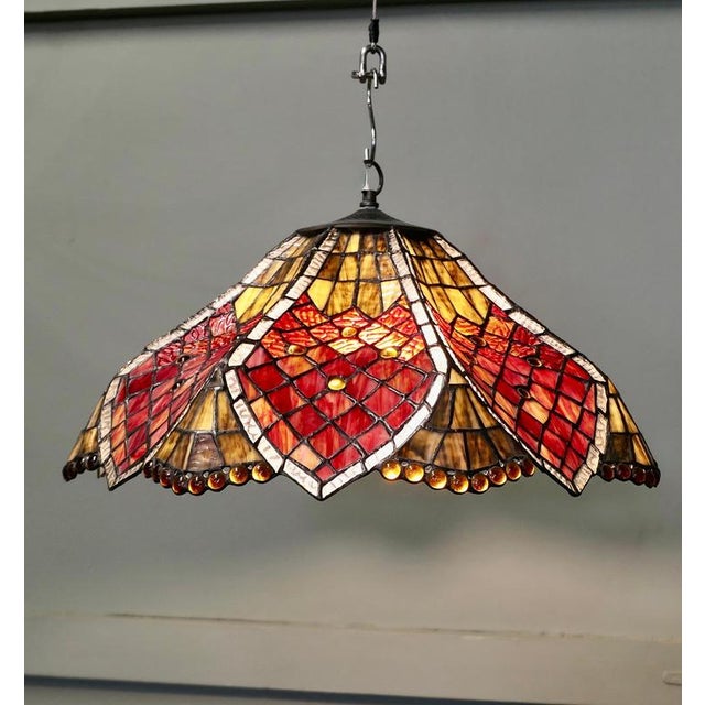 A Mid Century Tiffany Style Arts and Crafts Lampshade A lovely large lampshade in good sound condition, made in colourful...