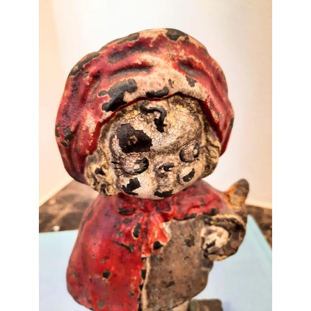 Vintage Hubley Cast Iron Little Red Riding Hood Doorstop. This collectible cast iron doorstop is a very old and sturdy...