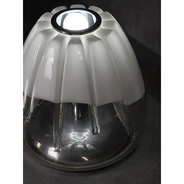 Glass and Steel Table Lamp, 1970s, in Very Good conditions. Designed 1970 to 1979 European Plug (up to 250V).The wiring of...