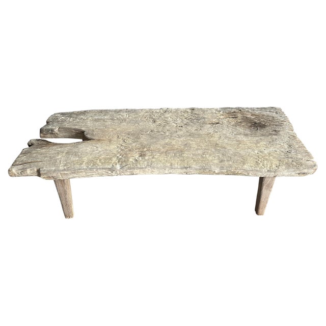 Beautiful century old two inch single teak slab is made into a coffee table with impressive erosion detail. Left in the...