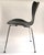 Elegant chair by Arne Jacobsen for Fritz Hansen. The official name of the seats is "model 3107". It is made of black...