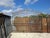 Monumental antique double-leaf gate in solid wrought iron with leaf-shaped spears and scrolls (4 meters wide) impressive...