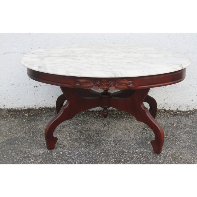This gorgeous Coffee Table is made out of wood, solid wood, solid mahogany, and marble. The Coffee Table has Victorian...