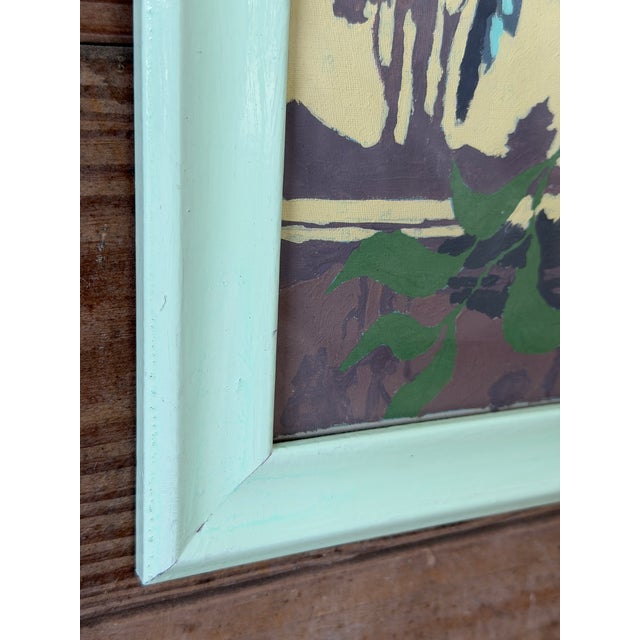 Charming vintage tropical painting depicting two colorful parrots perched on a branch against a lush landscape backdrop....