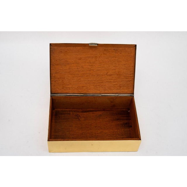 Brass polished and stove enameled Original wood inside