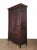 A large Louis XVI–style walnut armoire, France circa 1840.