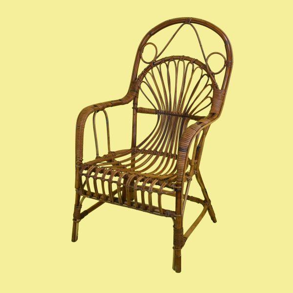 A set of four Italian chairs in bent rattan, the frames curved into the graceful, sculptural lines Italian makers do so...