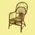 A set of four Italian chairs in bent rattan, the frames curved into the graceful, sculptural lines Italian makers do so...
