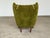 A teak and velvet lounge chair in the Danish Modern tradition, designed by Svend Skipper as Model 91, known in Denmark as...