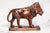Commanding and richly sculptural, this exceptional antique Victorian hand-carved wooden lion statue is a striking example...