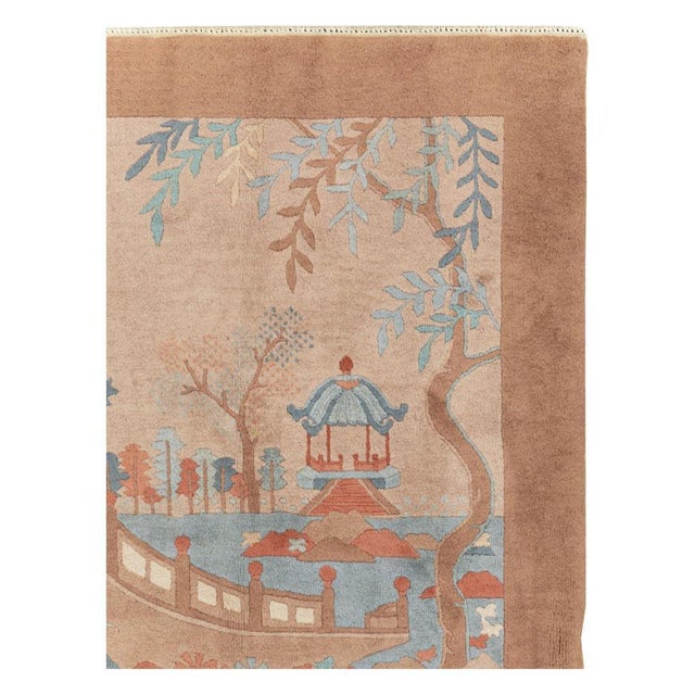 A vintage Chinese Art Deco throw rug handmade during the mid-20th century. Measures: 3' 11" x 6' 0".
