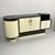 Timeless elegance and refined materials characterize this prestigious Art Deco sideboard. The soft, sinuous lines blend...