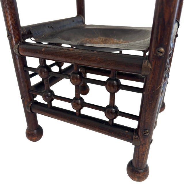 Charming antique faux-bamboo umbrella and walking stick stand dating to approximately 1890–1910, featuring an unusually...