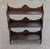 Exuding authentic 19th-century charm, this antique Victorian mahogany wall-hanging shelf unit features three spacious...