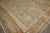 1900s Persian Bibikabad Antique Oversized Rug in grays, blues, caramel, and rust tones