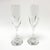 This elegant pair of Baccarat Massena champagne flutes features finely blown crystal with classic vertical cuts that rise...