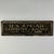 A unique and early 20th Century hand painted on metal with wood frame trade sign. It advertised "R.S. Apgar Carpenter &...