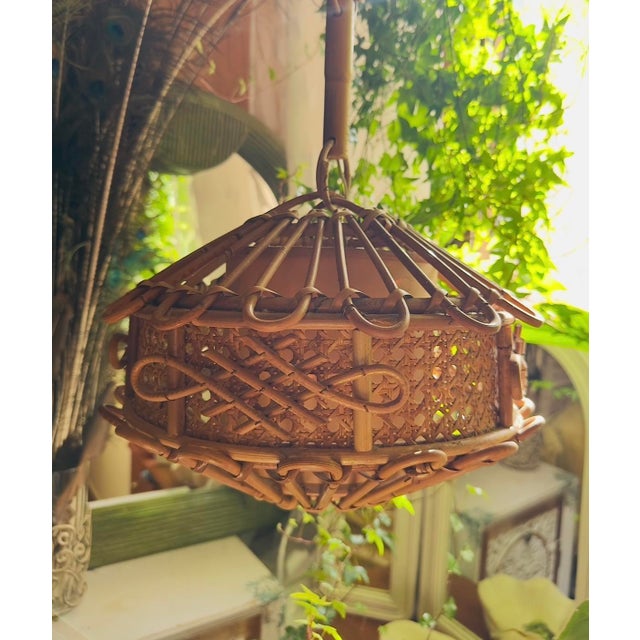 An exceptional original pendant lamp by Louis Sognot, crafted on the French Riviera around 1950, one of the designer's...